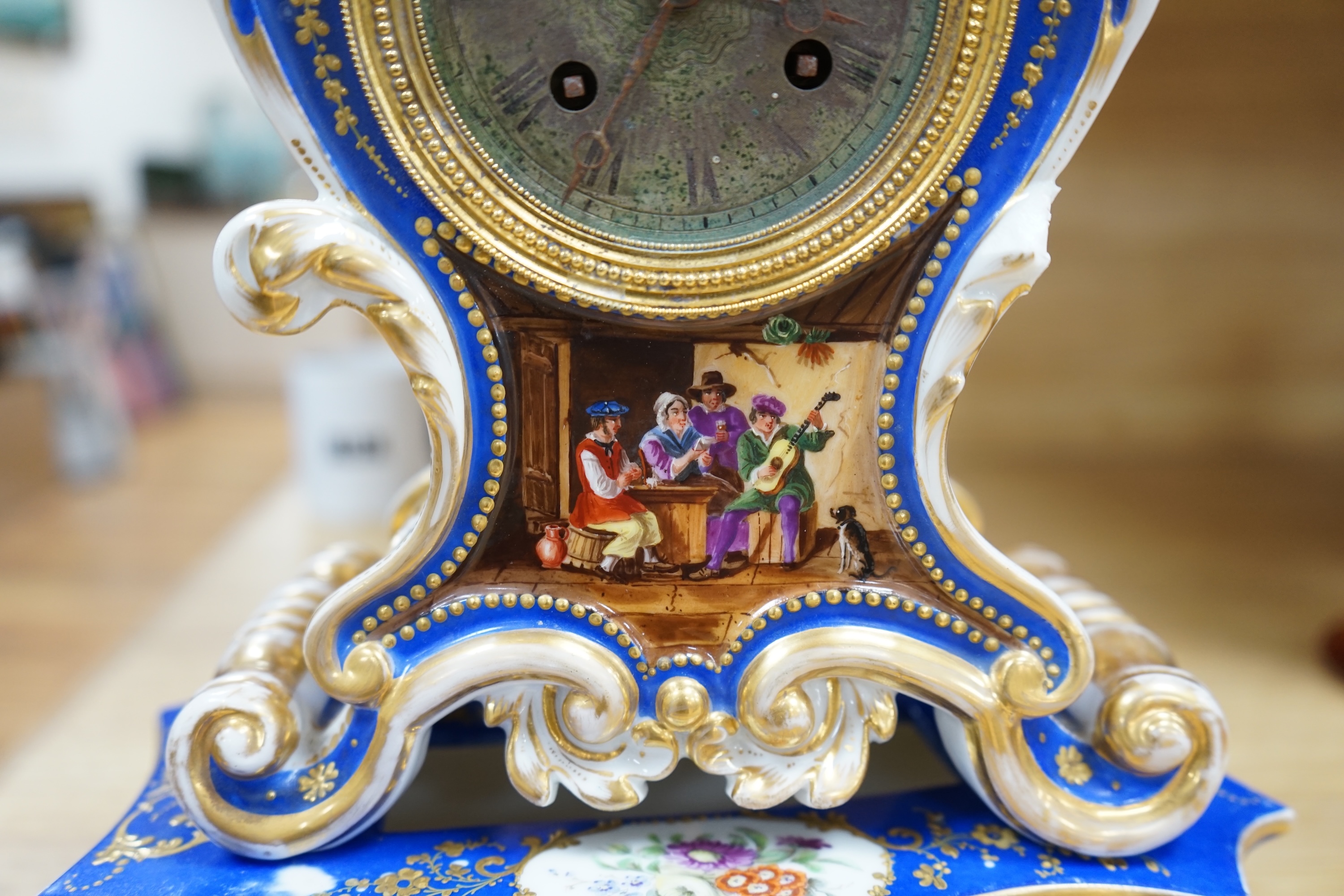 A French Paris porcelain waisted clock, striking on a bell, raised on original matching stand in the style of Jacob Petit c.1830, 37cm high. Condition - poor to fair